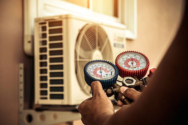 Professional Hvac technician working in Wells, ME